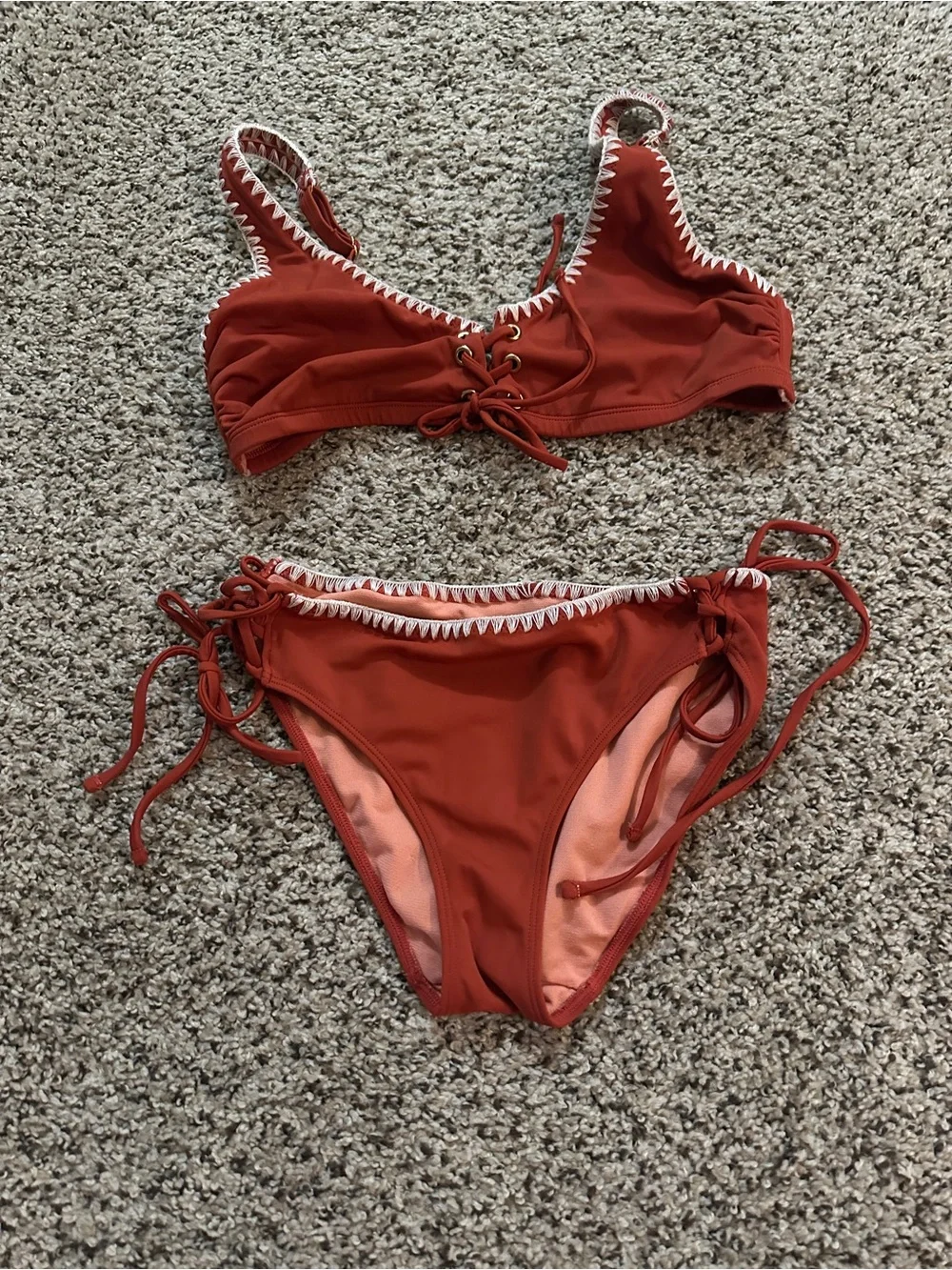 Adore-Me Lace-Up Bikini Set   Does tie on both sides of the bottoms